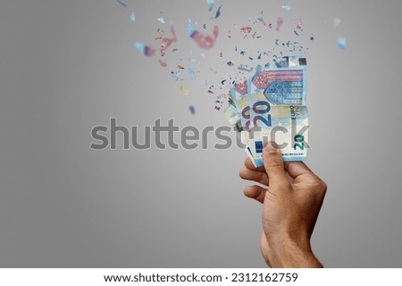 Inflation or loss of Money Euro vanishing into nothing Royalty-Free Stock Photo #2312162759