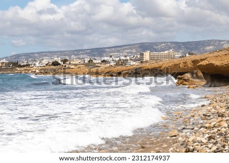 View of waves on beautiful coast of during spring sunny day in Paphos, Cyprus.