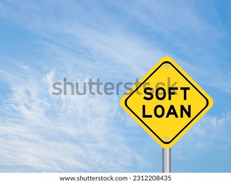 Yellow transportation sign with word soft loan on blue color sky background