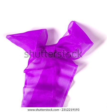Nylon ribbon tied in a bow on a white background.

