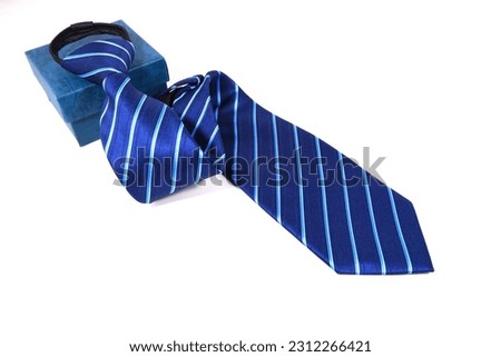 striped pattern blue color zipper necktie folded isolated over white background with gift box, close up shot of a tie, flat lay men's fashion accessories 
