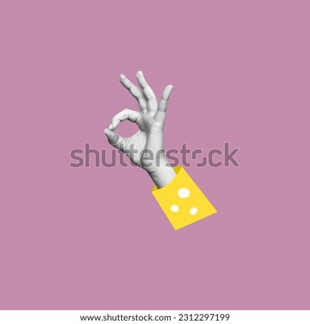 The female hand in yellow sleeve showing the ok gesture on a pink color background. Trendy creative 3d collage in magazine urban style. Contemporary art. Modern design. Okay hand sign