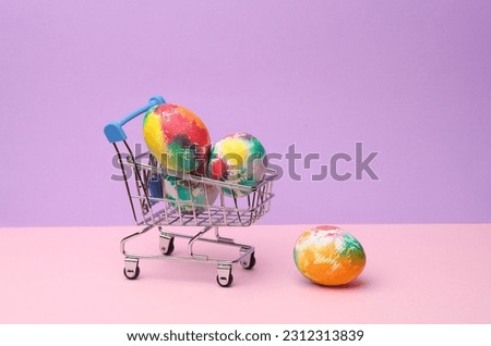 Supermarket cart with Easter eggs on a pastel color background. Minimalism Easter still life