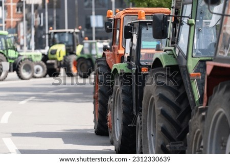 Farmers blocked traffic with tractors during a protest Royalty-Free Stock Photo #2312330639