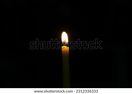 Candles in the dark room as background