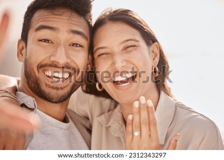 Couple in selfie, proposal and engagement ring with love and commitment, happy in portrait with social media post. Face, man and woman with marriage, happiness and care, smile in picture with jewelry