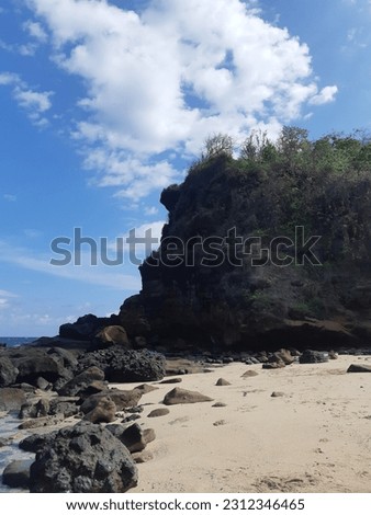 The beautiful Watu Ulo beach in Jember, Indonesia