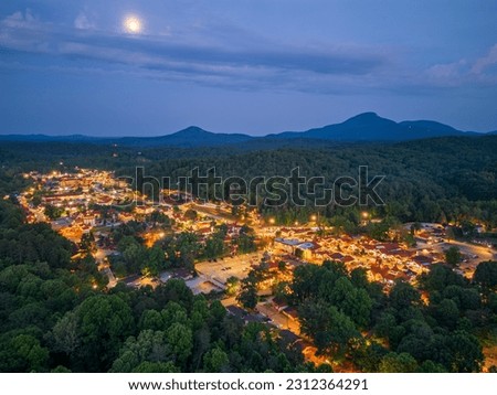 Helen, Georgia, USA downtown at night with Mt. Yonah in the distance. Royalty-Free Stock Photo #2312364291