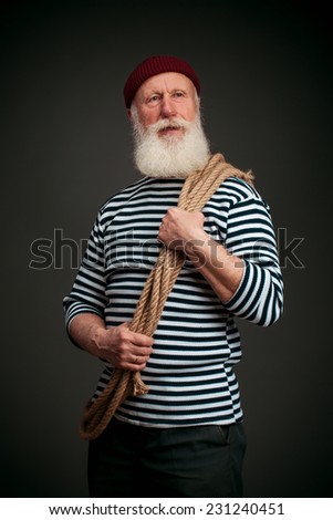 Handsome sailor isolated on black background. Seaman.