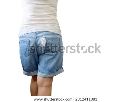 A jeans that accidentally crack at bottom of. Old jean ripped are torn at the bottom and can see dots panties. It because of fat or long time use. With clipping path on white background.