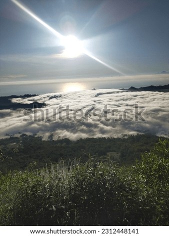 the atmosphere from the top of Mount Batur, Bali, Indonesia. And decorated with a sea of ​​​​clouds that are soothing