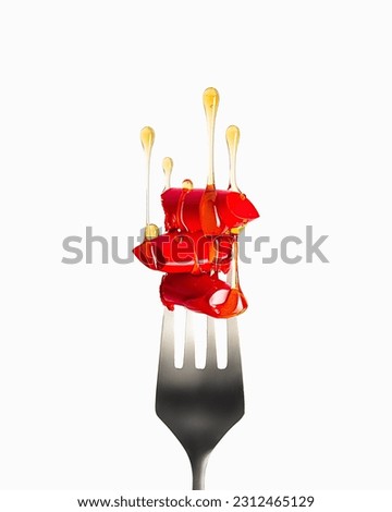 Red lipstick on the fork