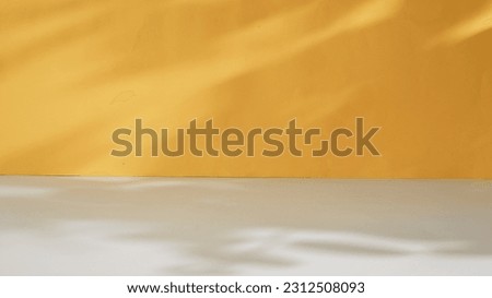 Abstract yellow studio background for product presentation, copy space