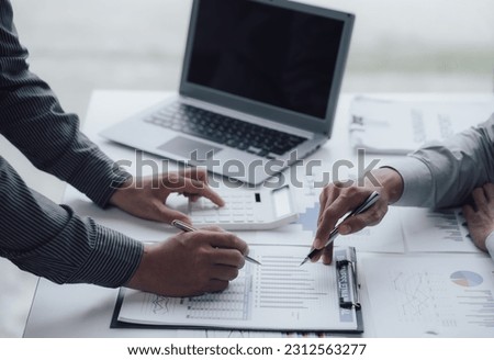 Business people talking about business strategy Collaborate teamwork during discussions on financial and marketing documents, financial data analysis meetings, and in-office charts