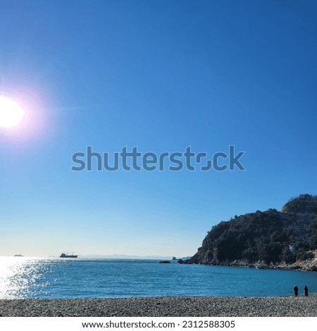 It is a wonderful view of the beach where the sun is shining in Busan, Korea.
