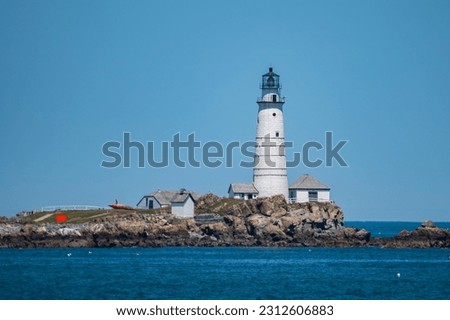 This lighthouse is called Boston Light which overlooks the sea from Little Brewster Island. I took this picture during a whale watching cruise on June 20, 2022.