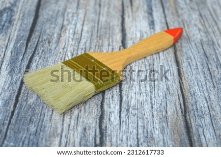a brush on a wooden table