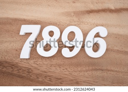 White number 7896 on a brown and light brown wooden background.
