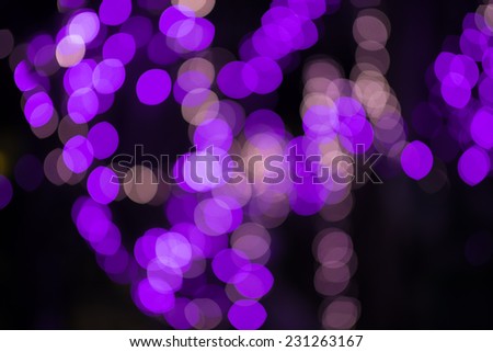 Artistic bokeh background. purple defocused light