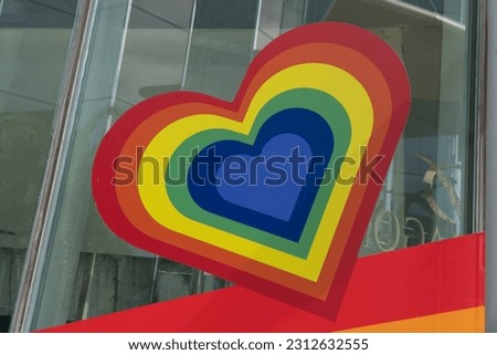 LGBT, pride, rainbow flag as a symbol of lesbian, gay, bisexual, transgender, and queer pride and LGBTQ social movements in June month Royalty-Free Stock Photo #2312632555