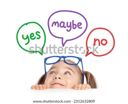 Beautiful cute little girl with eyeglasses hiding under table and looking at yes, no, maybe speech balloons. The little girl making up her mind. Royalty-Free Stock Photo #2312632809