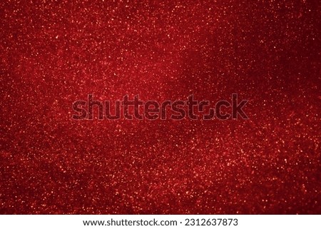 Countless vortex of gold particles in red liquid. Golden glittering sparkling particles in red fluid. Magical red galaxy with gold dust glistering. Royalty-Free Stock Photo #2312637873