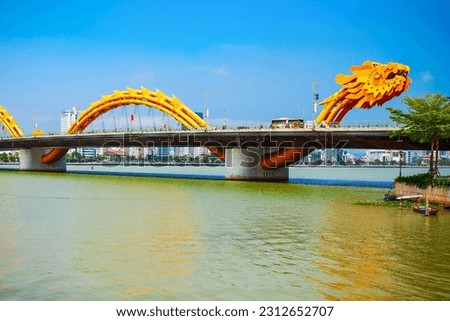 Danang Dragon bridge through Han river in Da Nang city in Vietnam