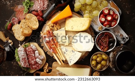 A mouthwatering Italian food platter - Italian Cheese platter Royalty-Free Stock Photo #2312663093