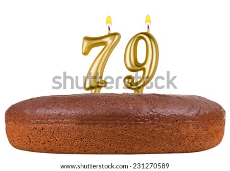birthday cake with candles number 79 isolated on white background