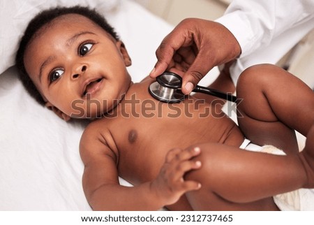 African, little baby and stethoscope in bed for health checkup or pediatrician with infant or healthcare clinic and medical wellness. Child patient, cardiology and expert with toddler in hospital Royalty-Free Stock Photo #2312737465