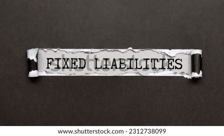 Asset Liability text written on a notebook with pencils