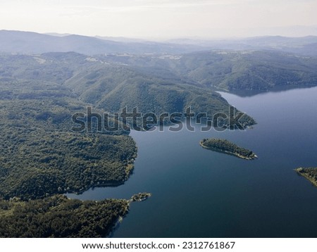 Aerial spring view of Topolnitsa Reservoir, Sredna Gora Mountain, Bulgaria Royalty-Free Stock Photo #2312761867