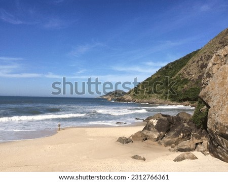 Pictures from Prainha, a beach in Rio de Janeiro's West Zone. Surrounded by mountains and native forest, Prainha offers amazing waves, making it a popular surfing spot.