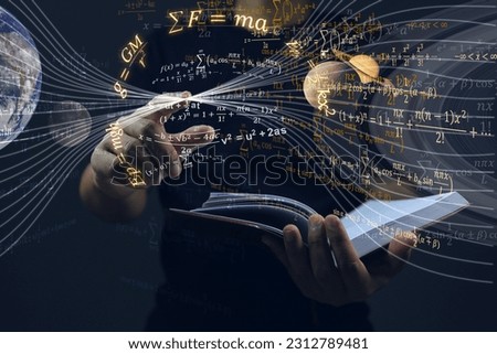 Students are opening their books and studying physics theories about space and the universe and the forces that each planet affects each other. physics equation and science concept. Royalty-Free Stock Photo #2312789481
