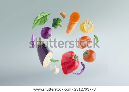 Floating vegetables color wheel nutrition and healthy eating Royalty-Free Stock Photo #2312793773