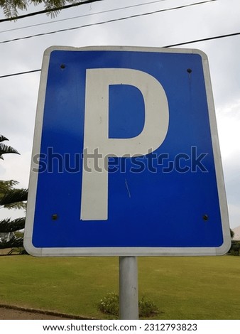 Traffic sign which means parking area.