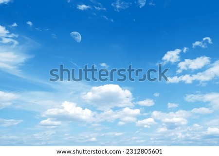 sky-clouds ,blue sky with moon on day time nature background.