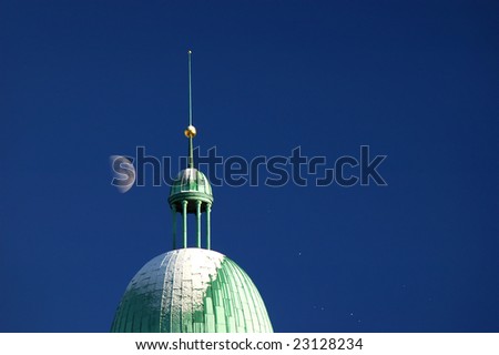 architecture detail in Berlin with moon in background
