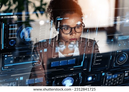 Black woman working in office and futuristic graphical user interface concept. ICT (Information Communication Technology). System engineering. Royalty-Free Stock Photo #2312841725