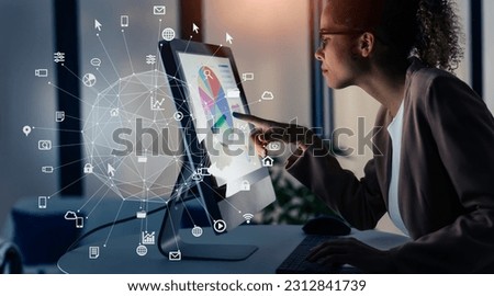 Black woman working in office and communication network concept. ICT (Information Communication Technology). Cloud computing. System engineering. Royalty-Free Stock Photo #2312841739