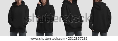 Mockup of a fashionable black long hoodie for a girl, streetwear for branding, design, commerce, front, back view. Template of a female longsleeve, isolated on the background. Product photography set Royalty-Free Stock Photo #2312857281