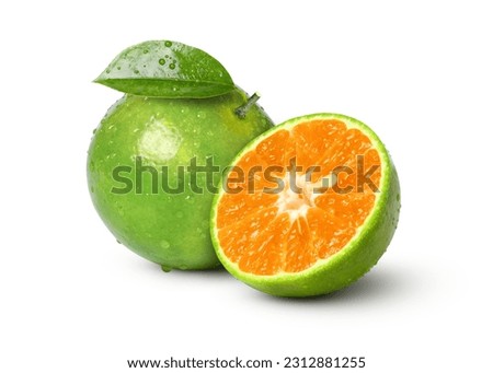 Green tangerine orange fruit with water drops and half slice isolated on white background. Royalty-Free Stock Photo #2312881255