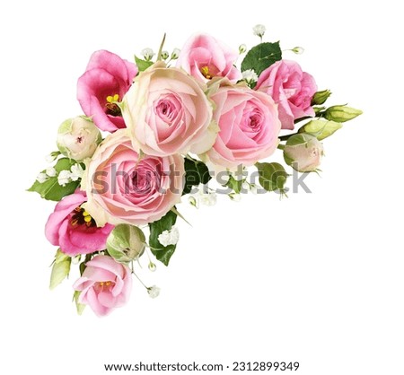 Pink rose, eustoma and gypsophila flowers in a corner floral arrangement isolated on white