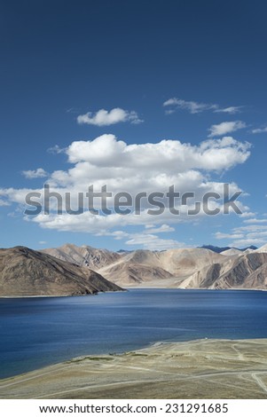 Mountain landscape with beautiful lake and roads at coast