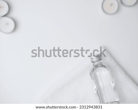 Composition with different spa products on white background, top view. Space for text