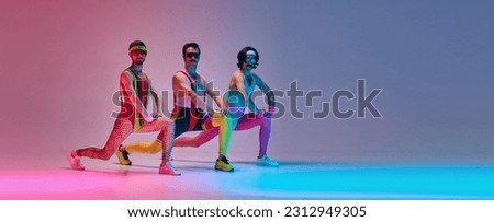 Sportive, serious man in funny sportswear stretching, training against gradient blue pink background in neon light. Sportive and active lifestyle, humor, retro style concept. Banner. Copy space for ad