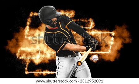 Baseball player with bat taking a swing on grand arena. Ballplayer on dark background in action. Royalty-Free Stock Photo #2312952091