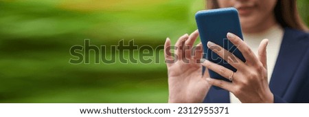 Banner with businesswoman texting or using mobile application on smartphone