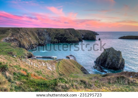 Sunset overlooking Mullion Cove on the Lizard Peninsula Cornwall England UK Europe
