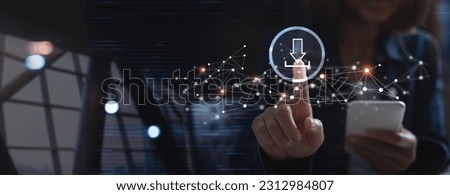 Downloading data storage concept. Woman using mobile smart phone, touching on download button and internet network connection on virtual screen, online marketing, digital technology Royalty-Free Stock Photo #2312984807